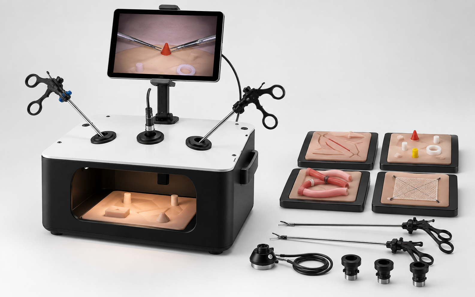 Portable laparoscopic training simulator with camera display and training instruments